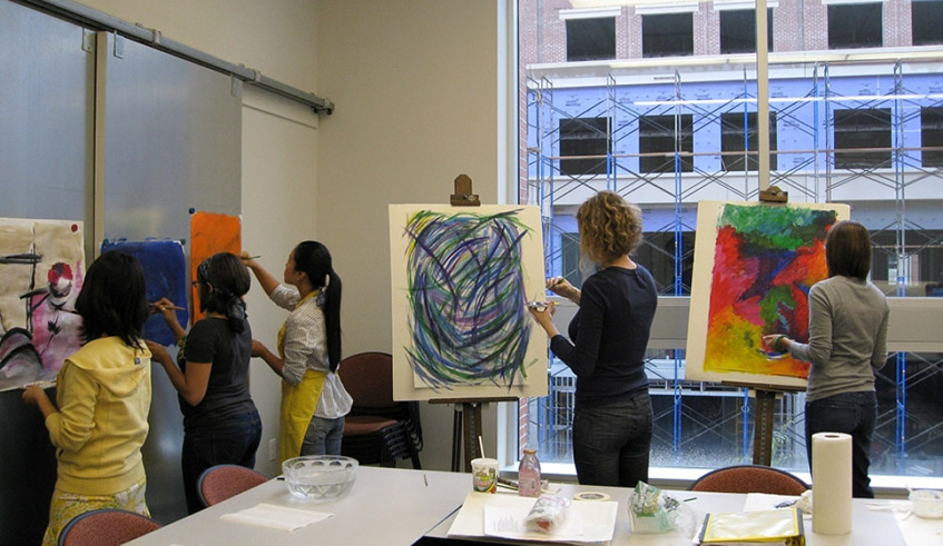 Dr Cindi Cassady showing the work of patients in art therapy. Photos/Courtesy