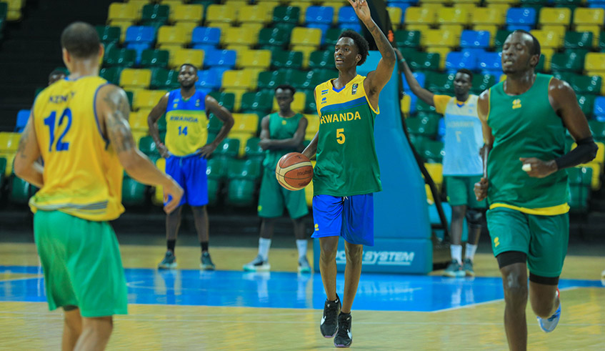 The national basketball team players during a training session in Kigali Arena. / Photo: Dan Nsengiyumva.