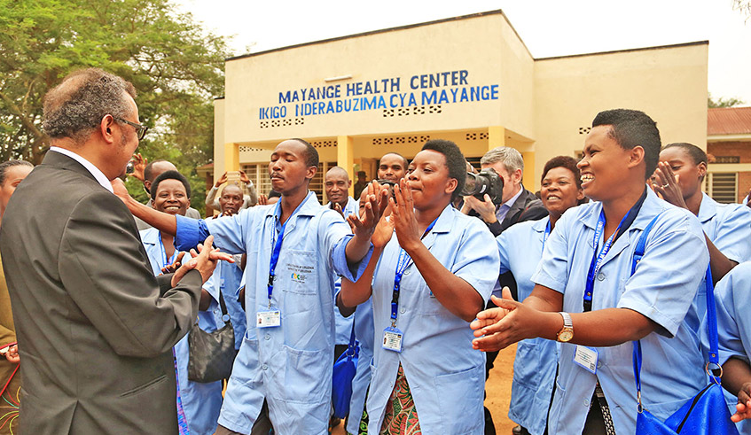 Community health workers welcome Dr Tedros Adhanom Ghebreyesus, the Director General of the World Health Organisation, at Mayange Health Centre in 2018. / Photo: File.