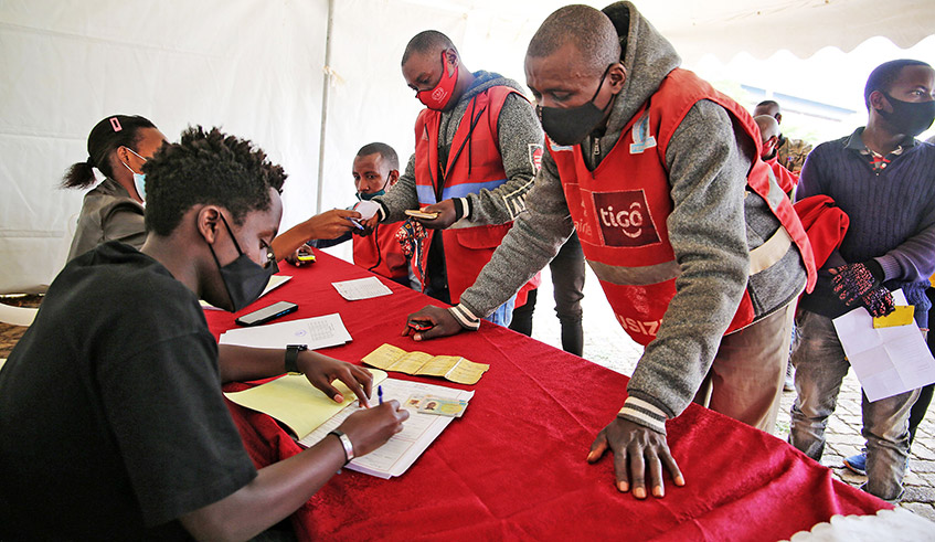 Taxi-moto operators register for the new smart metres in Gasabo District on Monday, 9 August. / Photo: Craish Bahizi.