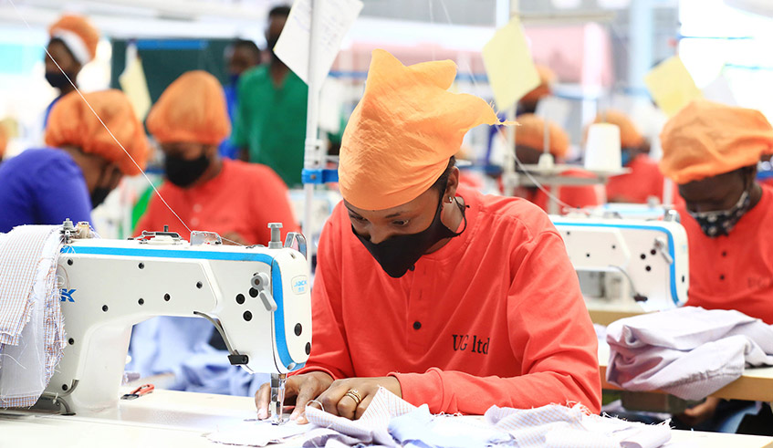 Employees of Ufaco Garment Ltd, one the factories at the Kigali Special Economic Zone on June 22. Central Bank Governor John Rwangombwa has said the economyâ€™s recovery will be driven by sectors such as manufacturing, construction and agriculture, which have a trickle-down effect across the entire country. / Photo: Sam Ngendahimana.  