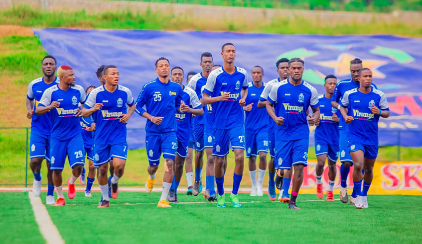 Rayon Sports players during a warm-up exercise before a league match in Muhanga in June 2021. Ferwafa has released new guidelinesu00a0allowing teams to train out of residential camp. / Photo: Courtesy.