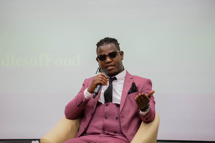 Bruce Melody in his remarks was pleased with the level his music has already achieved during the signing contract with the Food Bundle at Kigali Convention Center on August 25, 2021. 