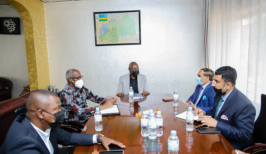 Pakistani High Commissioner to Rwanda Amir Muhammad Khan (2nd right) speaks during the meeting with Robert Bafakulera, the Chairperson of the Private Sector Federation (centre) as other officials look on in Kigali on August 31. / Photo: Dan Nsengiyumva.