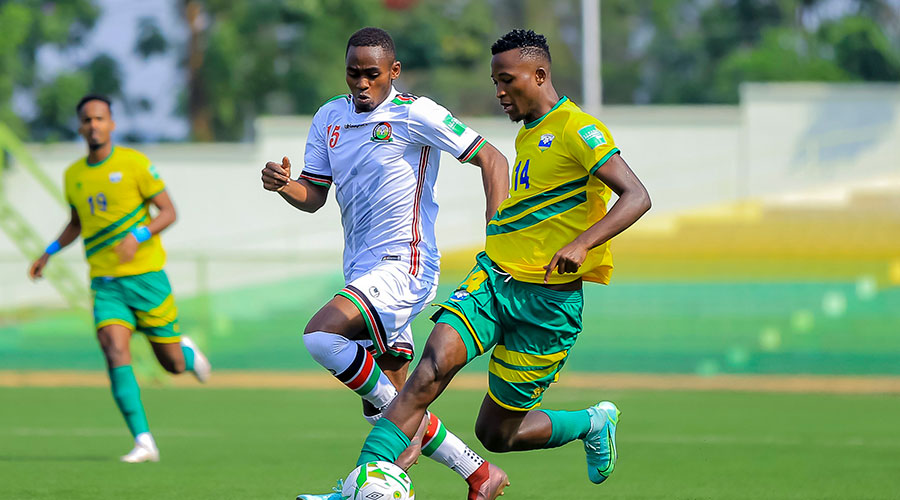 Amavubi striker Lague Byiringiro tries to go past a Kenyan defender during the 1-1 draw against Kenyau2019s Harambee Stars, on Sunday, September 5, at Kigali Stadium. 