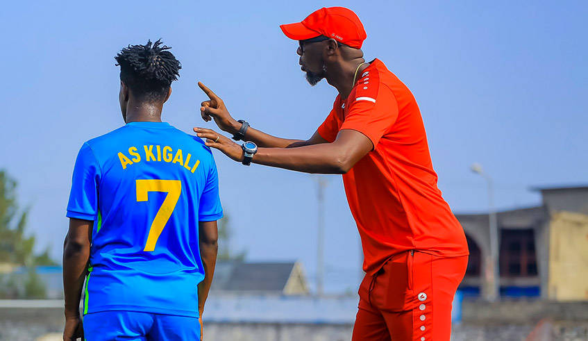 AS Kigali head coach Eric Nshimiyimana gives instructions to his player during a past match. / Courtesy.