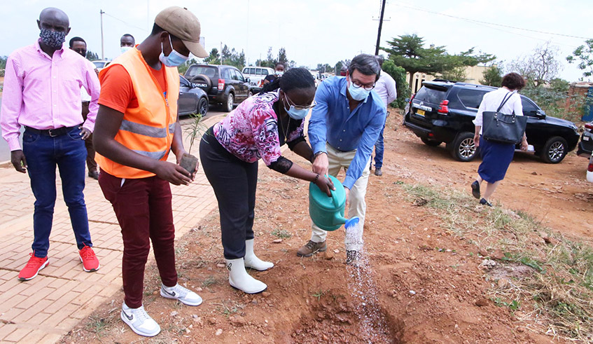 The Minister of Environment, Jeanne dâ€™Arc Mujawamariya and Nicola Bellomo, the EU head of delegation to Rwanda on a joint tree planting exercise during the launch of  the European Union Climate Diplomacy in Kigali on Monday, September 13. / Photo: Courtesy.