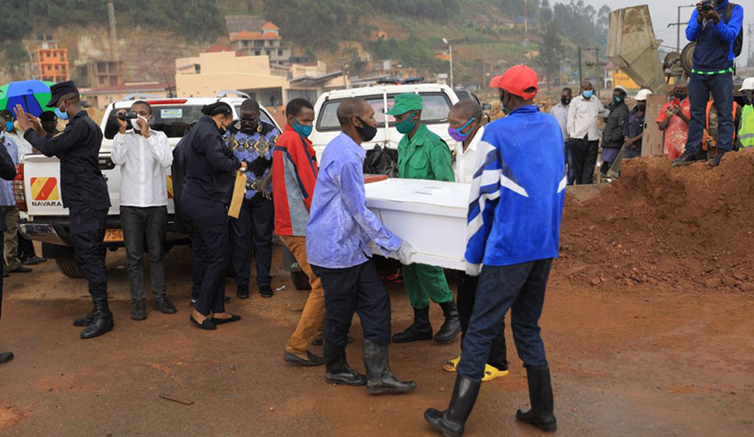 The bodies of the deceased Paul Bangirana, 47, and Theoneste Dusabimana, 52, were received by Felix Ndayambaje, the Mayor of Gicumbi District at Gatuna border, on September 9. / Photo: Olivier Mugwiza.