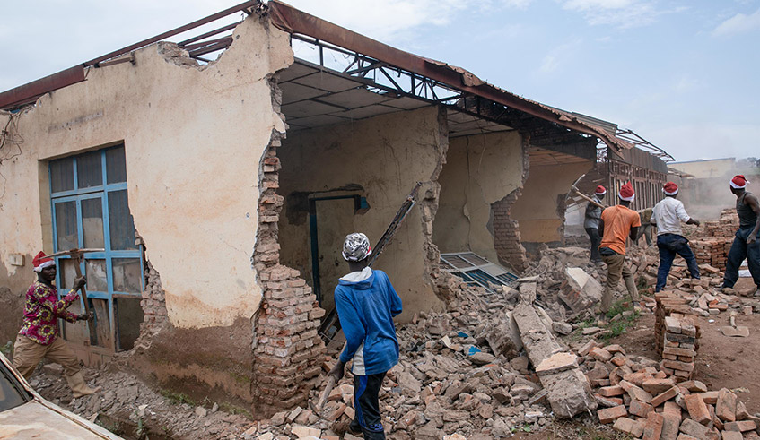 Workers demolish buildings that were reported to be in wetland in the former industrial area in Gikondo, Kicukiro District in 2019. / Photo: Sam Ngendahimana.