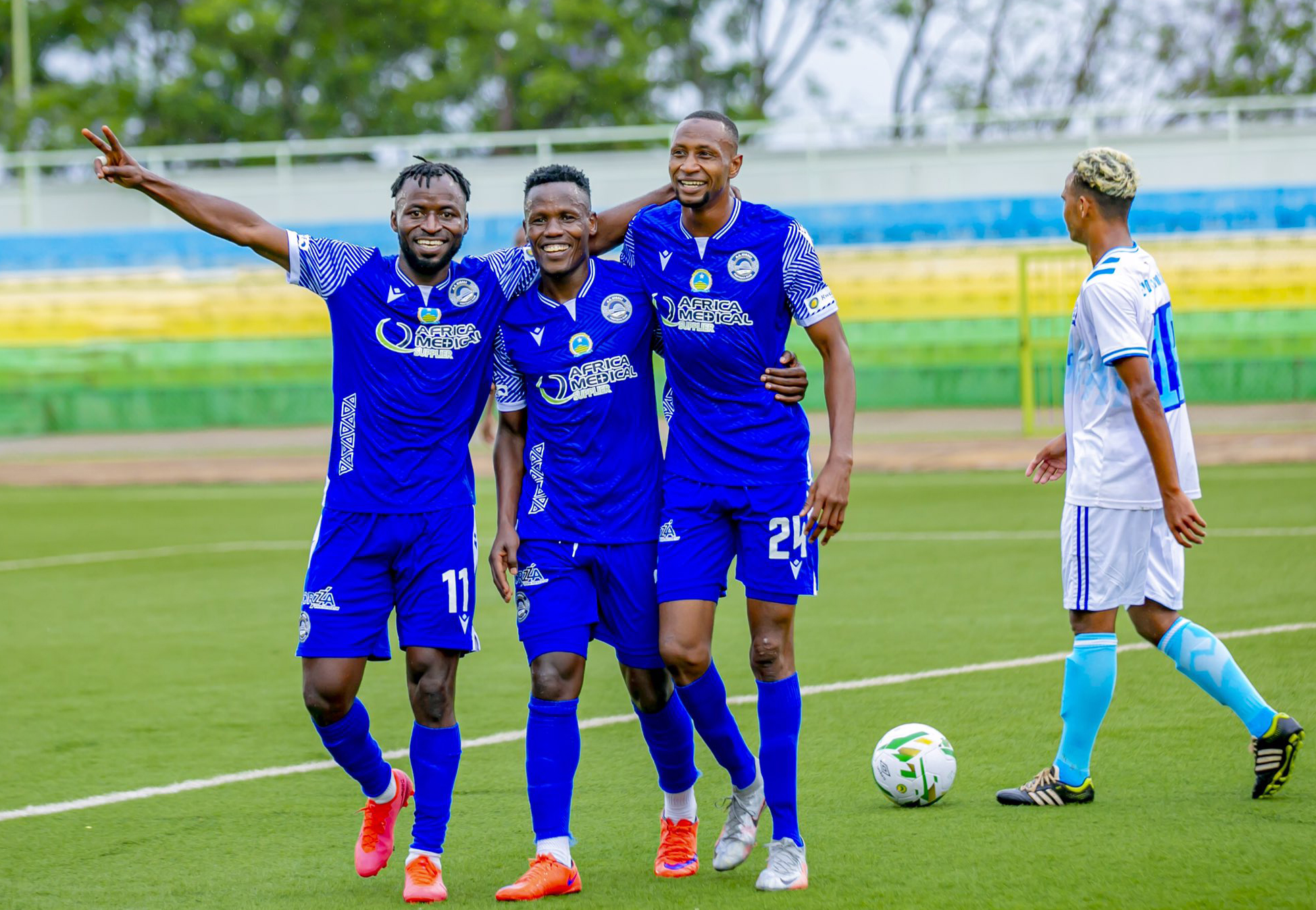 Shabalala celebrates his goal with his teammates during the match
