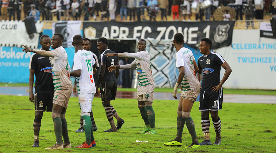 SC Kiyovu players (in white) preparing to defend a freekick against APR in a past league tie at Amahoro stadium in 2020. APR are the favourities to win next seasonu2019s league title but will face competition from teams like Rayon Sport and Kiyovu. 