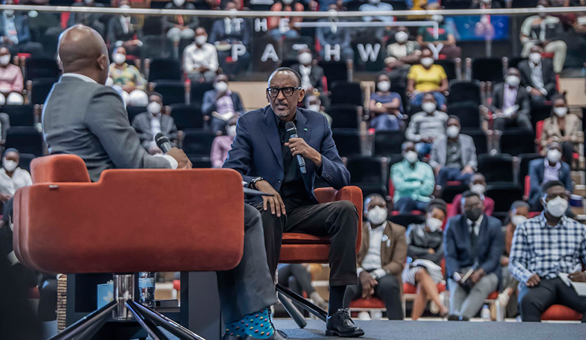 President Paul Kagame engages university students on Monday, September 20, at the Kigali Convention Centre during The Pathway series hosted by Fred Swaniker, founder of the African Leadership Group. The President urged young people not to shy away from tasks and responsibilities that seem hard, noting that the cost of leaving them undone could have long term consequences. / Photo: Village Urugwiro.  