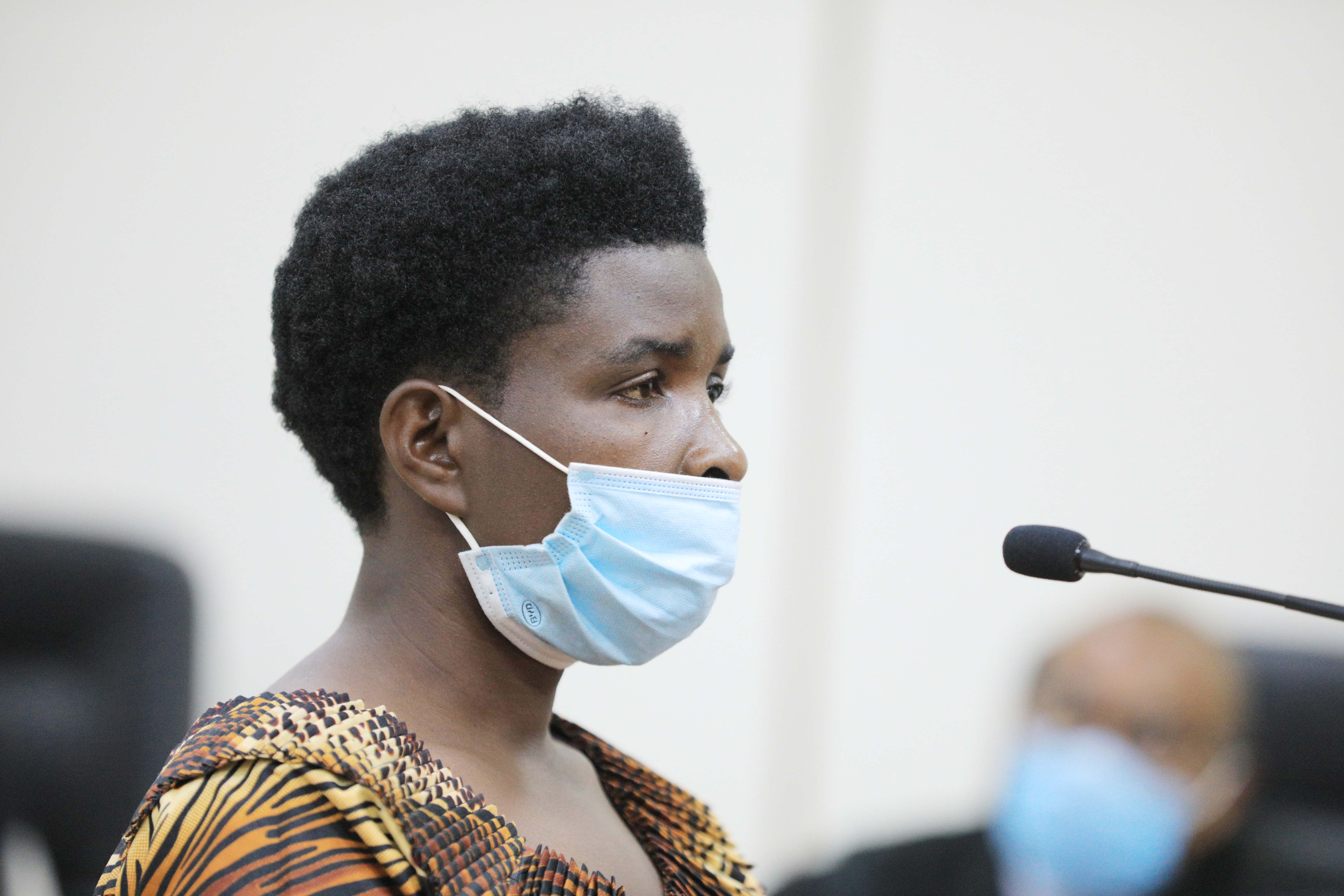 Elianna Nyirayumve, whose husband was killed by  FLN militia in Nyungwe, delivers testimony on June16, 2021. 