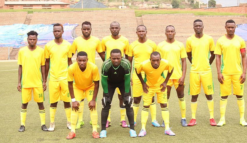 Gicumbi FC players pose for a photo before a past match. The club management is confident that they have a squad that can take them back to the top flight league. / Photo: Courtesy.