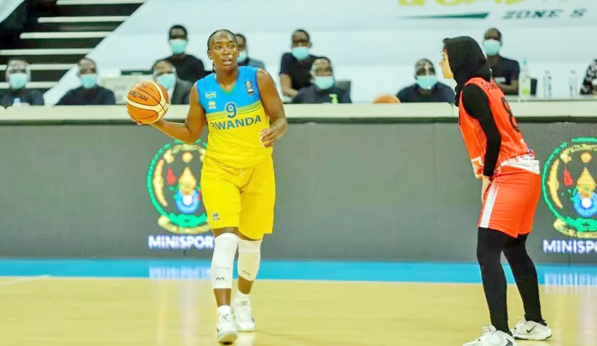 Tierra Monay Henderson, (L) in a past match against Egypt. The 34-year-old is slated to join REG women basketball club. / Photo: Dan Nsengiyumva.