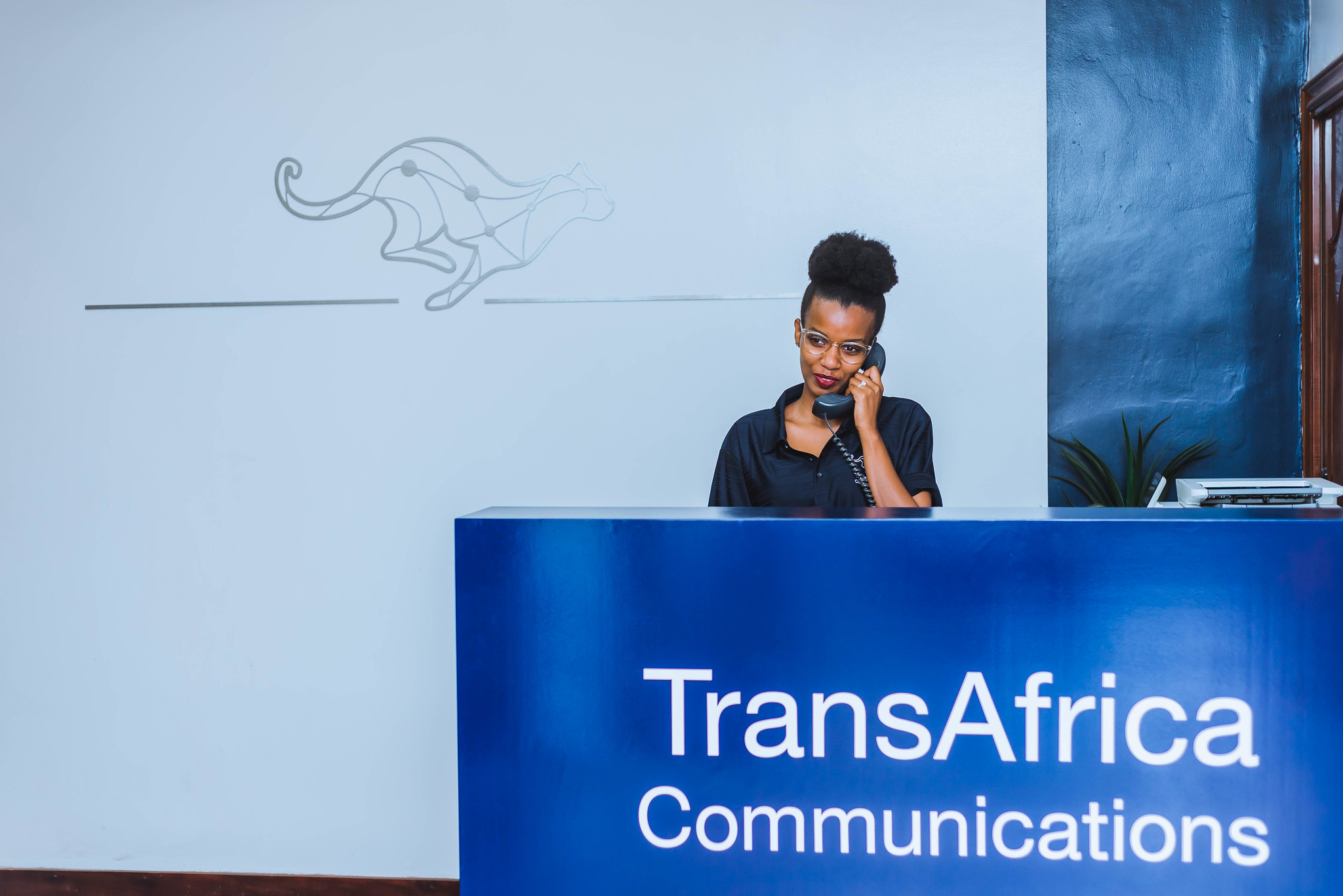An  agent  talks to a client  in call center at the headquarters of TransAfrica communications in Kigali . Photos by Craish Bahizi