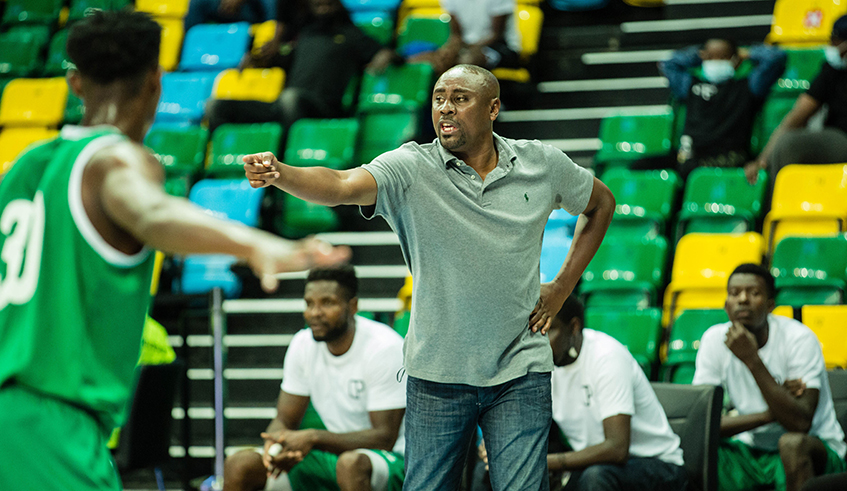 IPRC-Kigali Basketball club head coach John Bahufite shouts instructions to his players during a past match. / Dan Nsengiyumva.