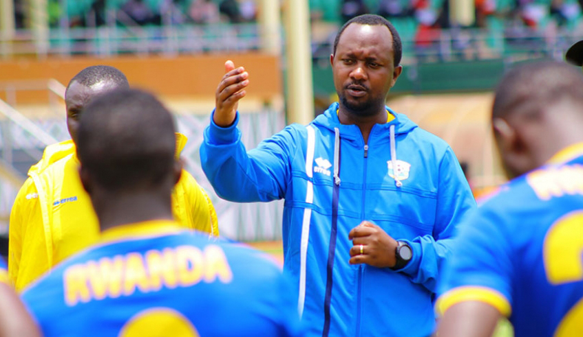 Amavubi coach Vincent Mashami speaks to his players during a past training session at Amahoro Stadium. The national football team started residential training yesterday. / Photo: File.
