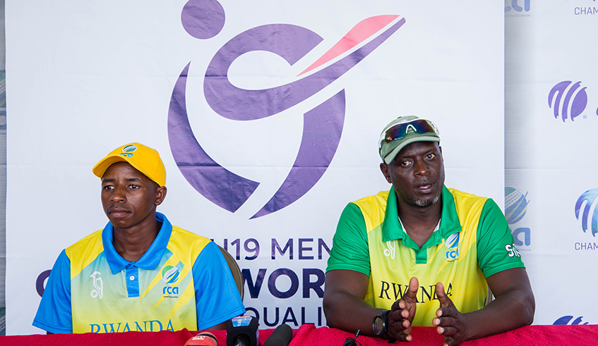 The national menu2019s cricket team head coach Martin Suji (R) and captain Didier Ndikubwimana speak to the media on Wednesday before the start of the ICC U-19 World Cup Africa qualifiers today. / Photo: Dan Nsengiyumva.