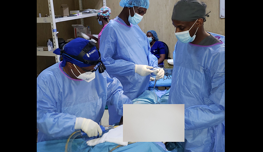 Plastic surgeons doing a liposuction at Rwanda Military Hospital. Photo/Courtesy