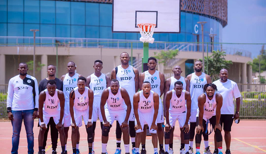 APR Basketball team players and coach pose for a group photo before a league game against Rusizi BBC on October 2 . / Courtesy