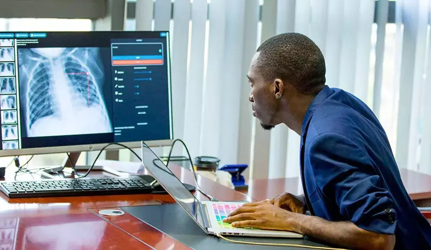 Audace Nakeshimana, the founder of local start-up Insightiv, demonstrates how artificial intelligence can be used in the health sector in Kigali last year. / Photo: File.