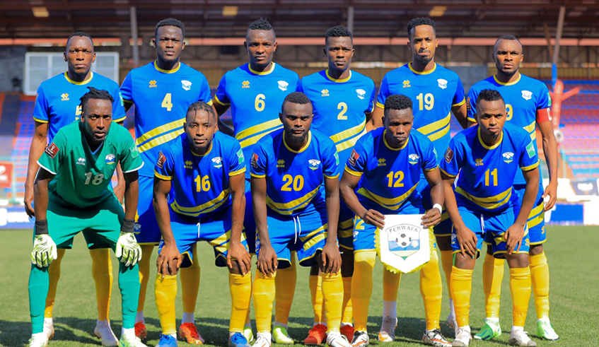 Amavubi players pose for a group photo before the second leg match against Uganda Cranes in Kampala on October 10. / Courtesy.