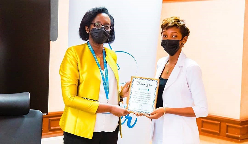 Hense Teta Musana(R), here posing with BK CEO Diane Karusisi, received financial support from BK worth Rwf 24 million to start her project.