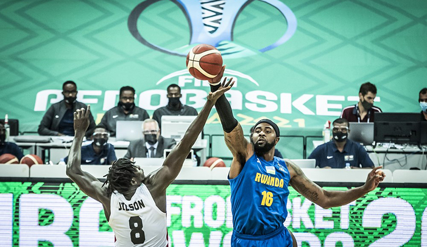 Prince Ibeh (R) was part of the Rwandan roster that played the 2021 Afrobasket finals in Kigali. / Photo: Courtesy.