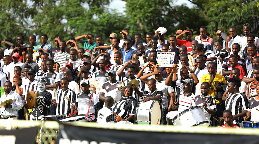 APR FC fans cheering their team in a past match. The Ministry of Sports says fans will be allowed in stadiums next season. 