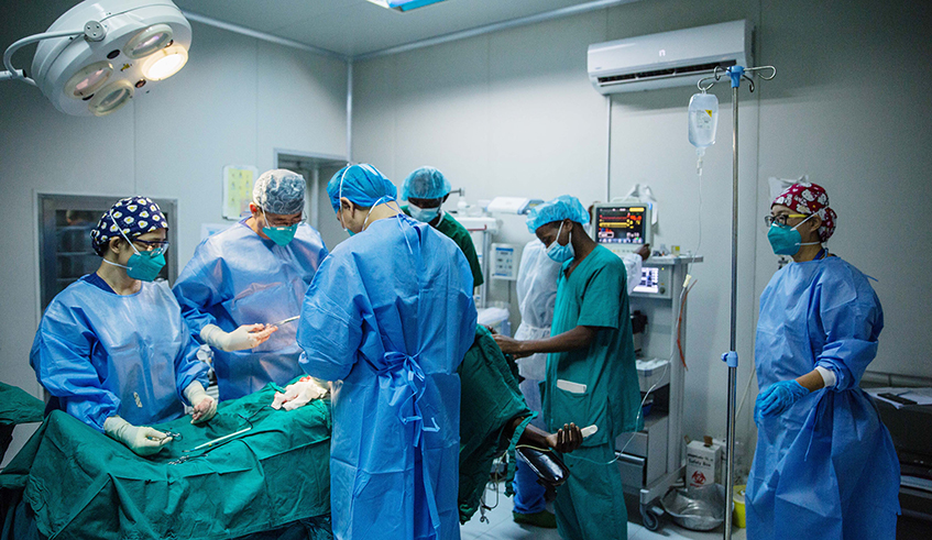 Chinese doctors during a surgical procedure at Masaka Hospital in Kigali on October 15, 2021. / Photo: Dan Nsengiyumva.