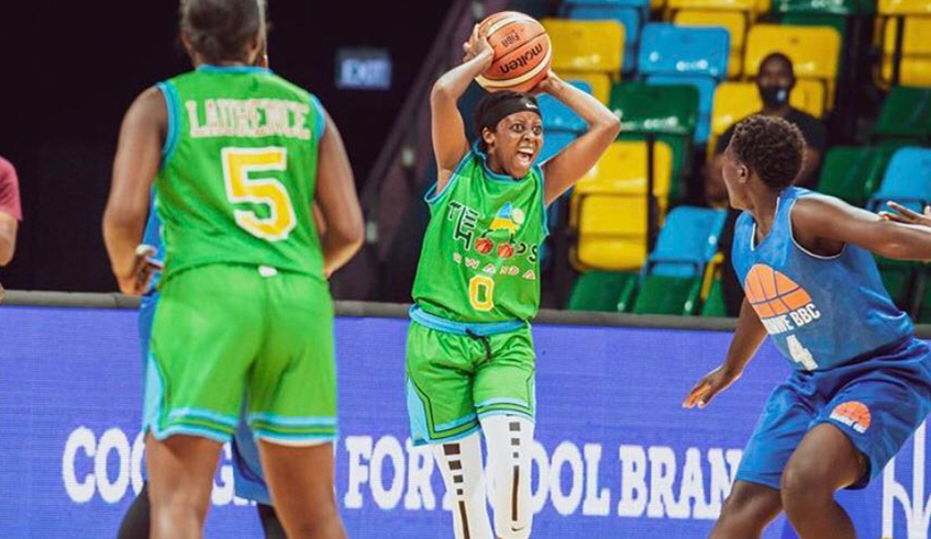 The Hoops Rwandau2019s Rosine Micomyiza with the ball during a past league match. They are the defending champions of the Womenu2019s Basketball League started the 2020-2021 season. / File.