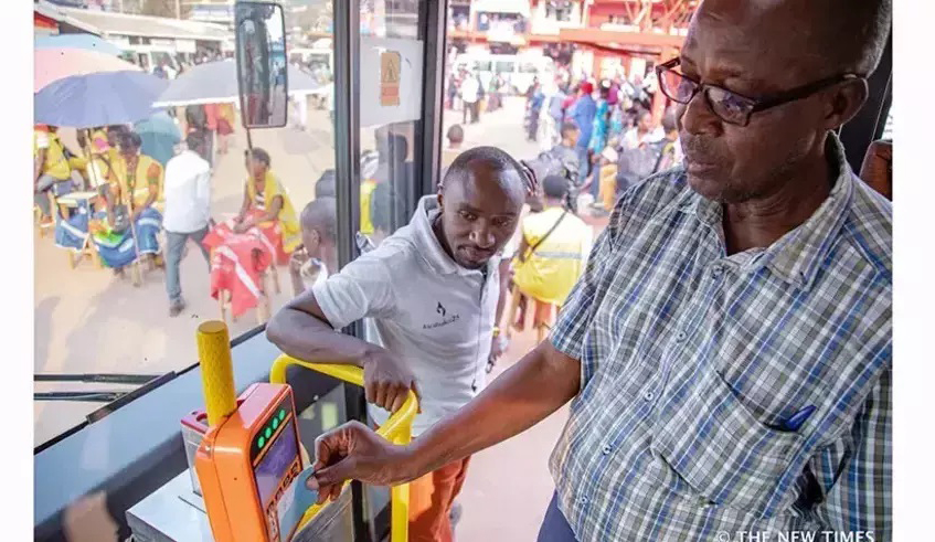 A passenger uses a Tap&Go card to board transport bus in Kigali. Digitalisation has been reshaping economic activity across all sectors and regions for the past four decades, impacting developed and developing countries alike. / Photo: File.