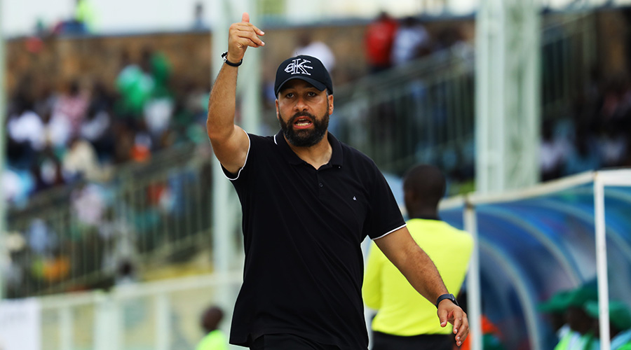 APR FC head coach Adil Erradi Muhammed shouts instructions to his players during the match at Kigali Stadium. Supporters of APR are frustrated by the clubu2019s poor run in the CAF champions league after the team was eliminated from the competition. / Sam Ngendahimana.