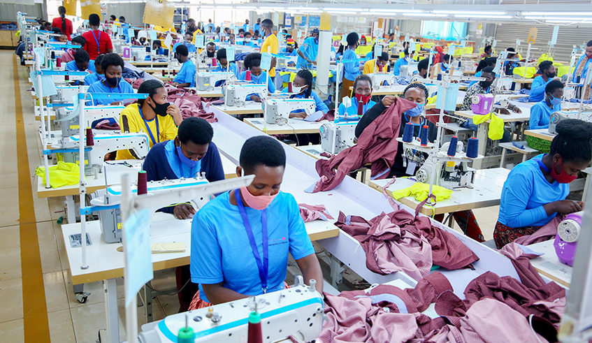Workers on duties at Pink Mango, the garment factory at the special economic zone in the City of Kigali. / Photo: Dan Nsengiyumva.