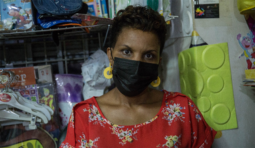 Claire Uwinyange, a seller of childrenu2019s products . / All photos by Dan Nsengiyumva