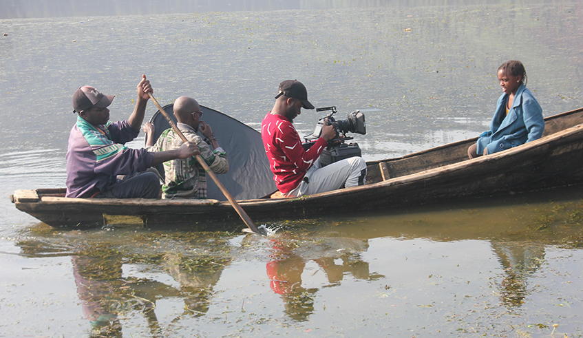 Nkubiri (second from behind) directing his film u2018Rusarou2019 which is contesting for Rwf 250 million for the My Rode Reel 2021 contest. / Courtesy  photo.