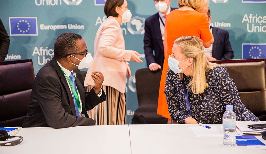The Minister for Foreign Affairs and Cooperation, Dr Vincent Biruta, chats with the EU Commissioner for International Partnerships, Jutta Urpilainen, during the just-concluded African Union-European Union Summit in Kigali. Leaders present at the summit agreed on the need to make Africa and Europeu2019s partnership fit for purpose. / Photo: Dan Nsengiyumva. 