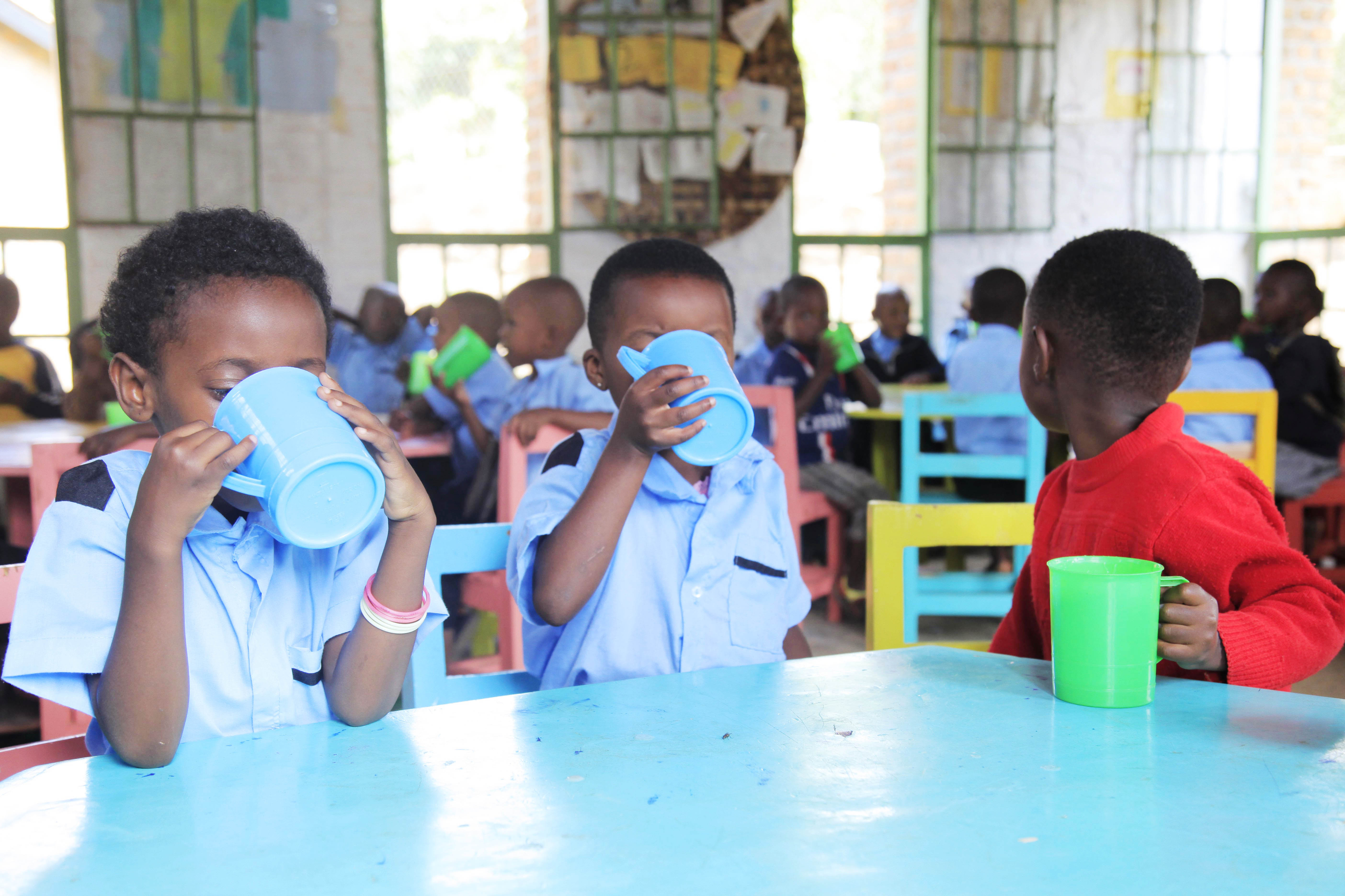 Children drink porridge at Mageragere Early childhood development Center in Nyarugenge District .Photo by Sam Ngendahimana