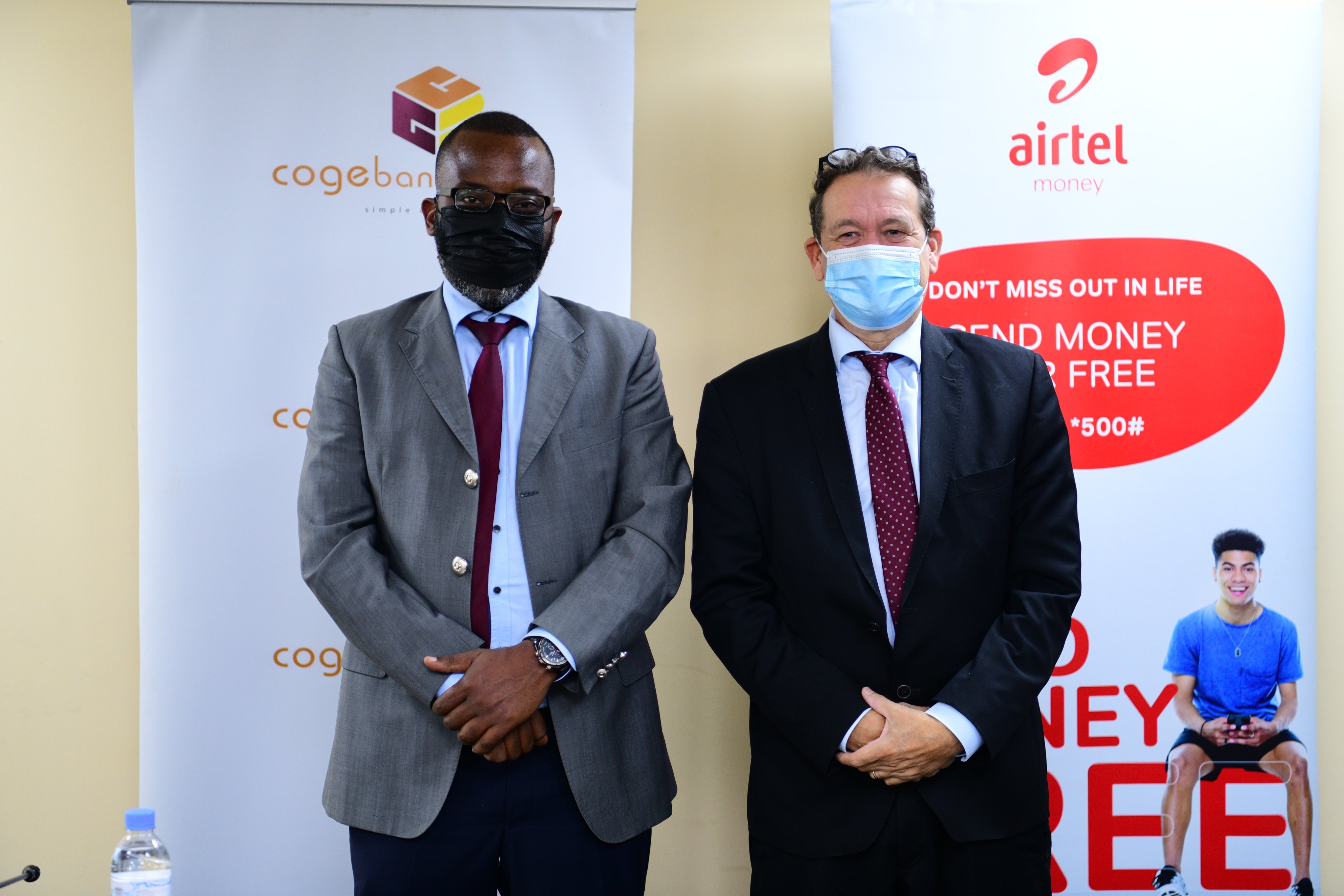 Guillaume Ngamije Habarugira, Chief Executive of Cogebanque Plc  and  Emanuel Hamez, Managing Director, Airtel Rwanda during  the launch of the Push and Pull partnership  on Thursday October 28. Courtesy