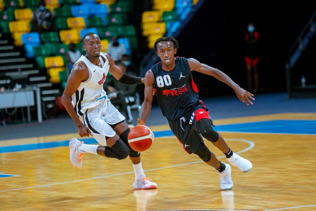 Star point guard Jean-Jacques Wilson Nshobozwabyosenumukiza (R) was instrumental to REG's first league title since 2017. 