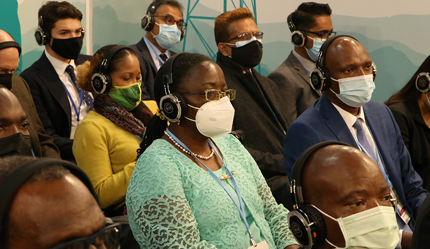 Environment minister Jeanne d'Arc Mujyawamariya (centre in glasses) and the Deputy Director General of REMA Faustin Munyazikwiye (in blue suit) during a session in COP26 on Monday, November 1. / Courtesy