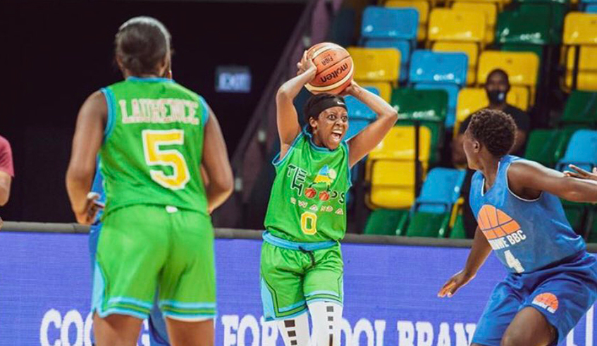 The Hoops Rwandau2019s Rosine Micomyiza with the ball during a past match against Ubumwe BBC. / Photo: Courtesy.