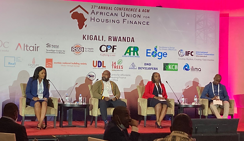 Panelists during a discussion on ways to improve affordability of housing units during the 37th Annual General Meeting and conference of African Union for Housing Finance, held in Kigali. / Photo: Courtesy.