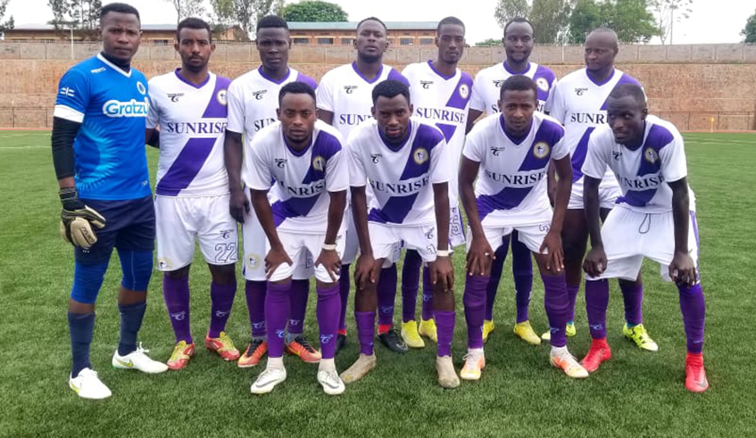 Sunrise FC players in a group photo before a friendly game against Etoile de lu2019Est in October. / Photo: Courtesy.