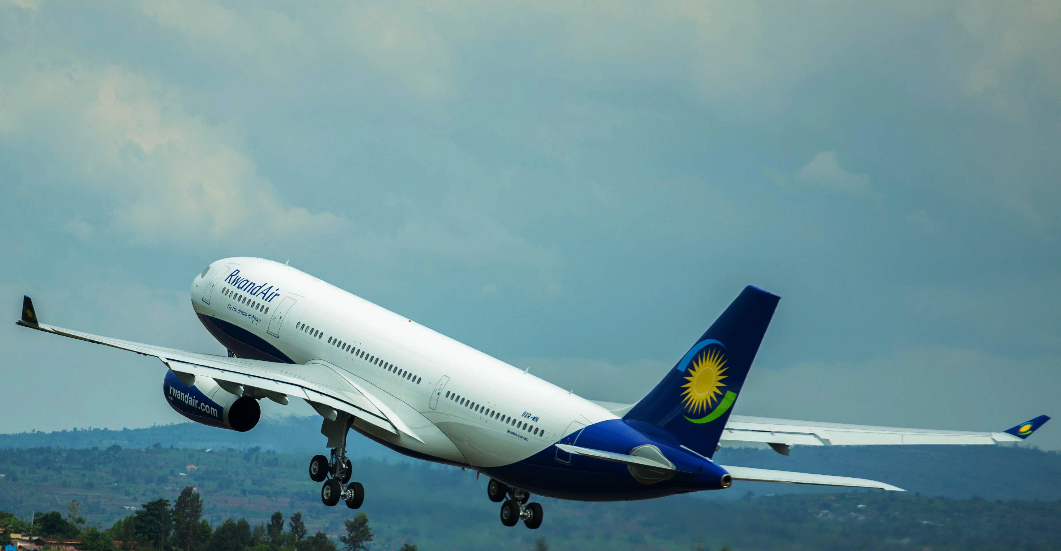 RwandAir's plane taking off at Kigali International Airport. 