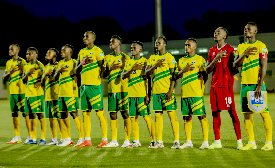 Amavubi players sing the national anthem before the game against Mali at Kigali Stadium. 