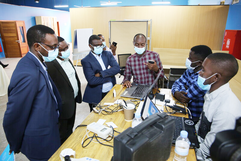Univesirty of Rwanda's College of ICT and Technology students showcase their ITC skills to NIRDA officials on June 18. 