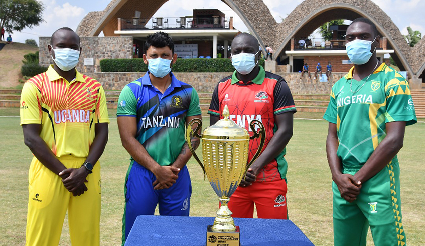 L-R Captains of Uganda, Tanzania, Kenya and Nigeria pose with the trophy of the ICC Menu2019s T20 World Cup qualifiers that will take place from November 17-20 in Kigali. / Courtesy.