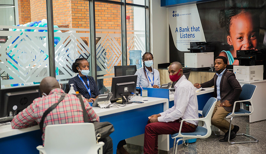 I&M customers deal with the bank's staff at the headquarters in Kigali on October 4, 2021. / Dan Nsengiyumva
